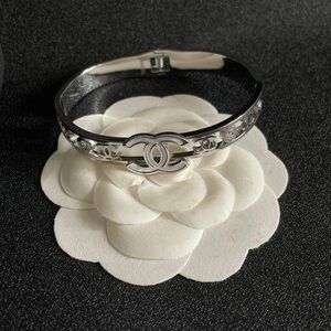 CHANEL Silver Bracelet with Iconic Emblem
